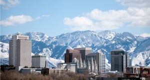 salt-lake-city-utah-winter-skyline-with-snow-covered-mountains-picture-id160735798